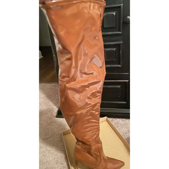I am selling a pair of Steve Madden, brown over the knee boots, size 8. - Picture 2 of 4